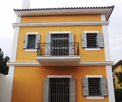 Folding security doors